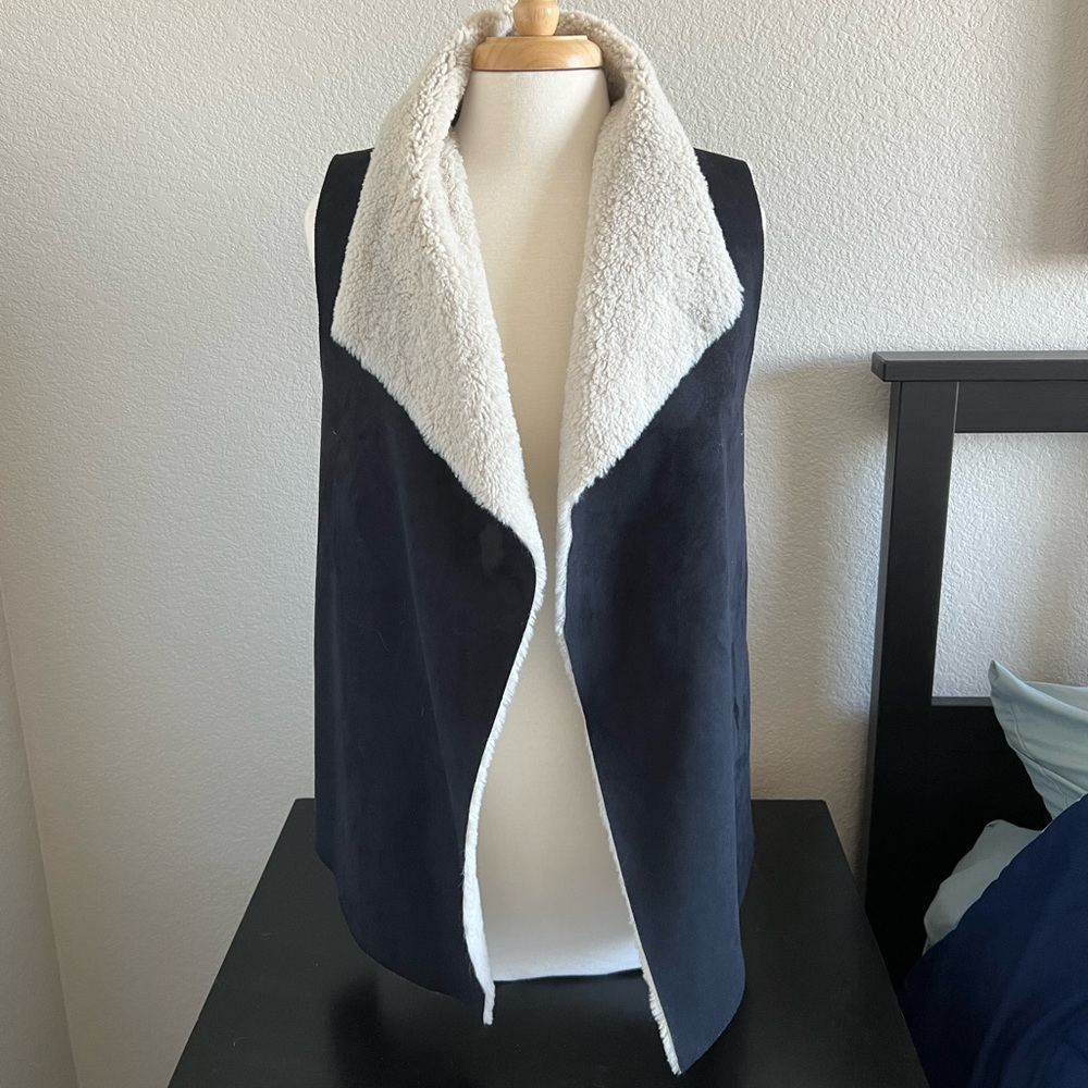 Madison and Lola Faux Fur black and white vest.